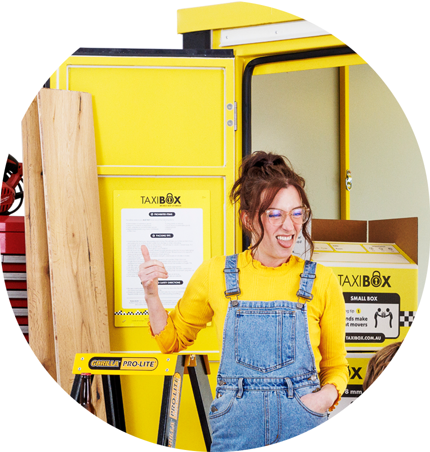 woman in yellow happy